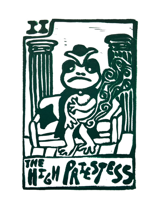 Dark green Tarot card print of a stylized frog and 'The High Priestess' text on a white background.