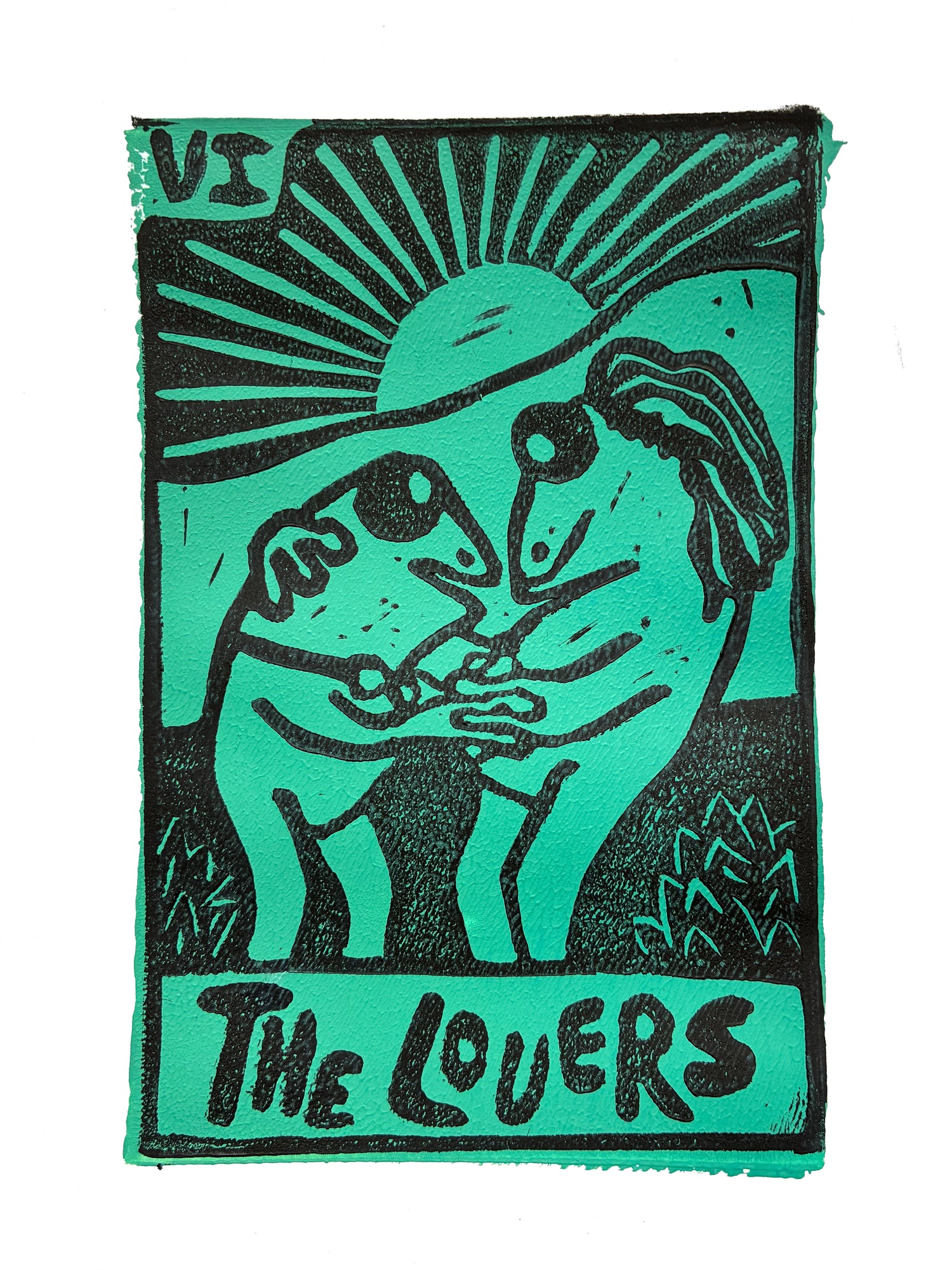 Green and black Tarot card print with two stylized frogs dancing and 'The Lovers' text on a green background.